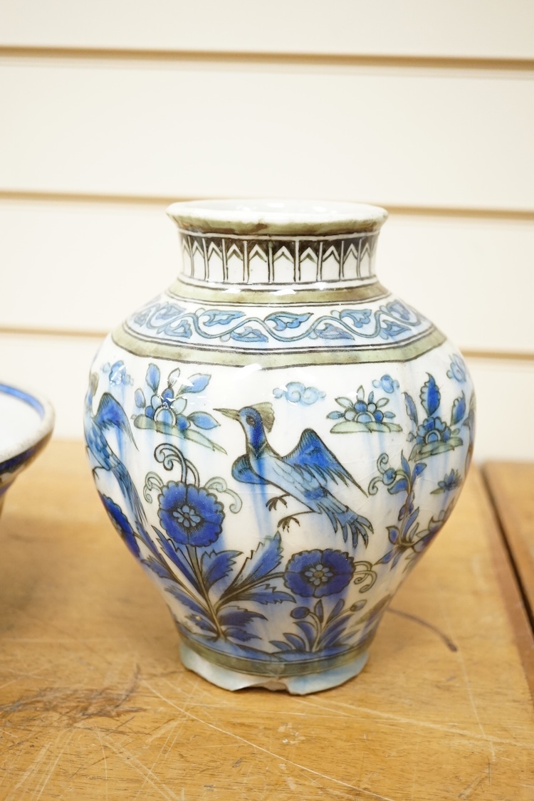 A Persian bird painted fritware lobed vase, 19.5cm high and a similar bowl, Qajar dynasty (2)